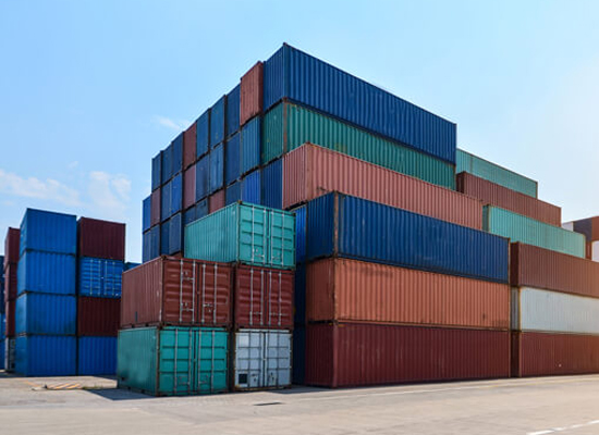 Large shipping container stacked at port