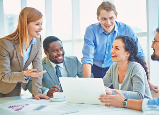 Team having a fun discussion in office